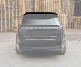 Load image into Gallery viewer, Gloss Black Range Rover Vogue L460 2022+ roof spoiler with Enkahnz branding on an opaque white background with the rest of the car in a warehouse setting.

