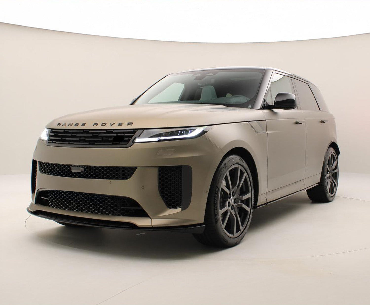 Beige Range Rover Sport SV Style 2023+ with 'Enkahnz' branding on a beige background.