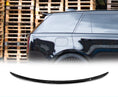 Load image into Gallery viewer, Side view of a Range Rover L460 Vogue Gloss Black with a Mid Boot Spoiler with wooden pallets in the background and the rear roof spoiler placed in front of a white background in the bottom.
