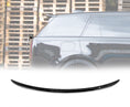 Load image into Gallery viewer, Side view of a Range Rover L460 Vogue Gloss Black with a Mid Boot Spoiler with wooden pallets in the opaque white background and the rear roof spoiler placed in front of a white background in the bottom.
