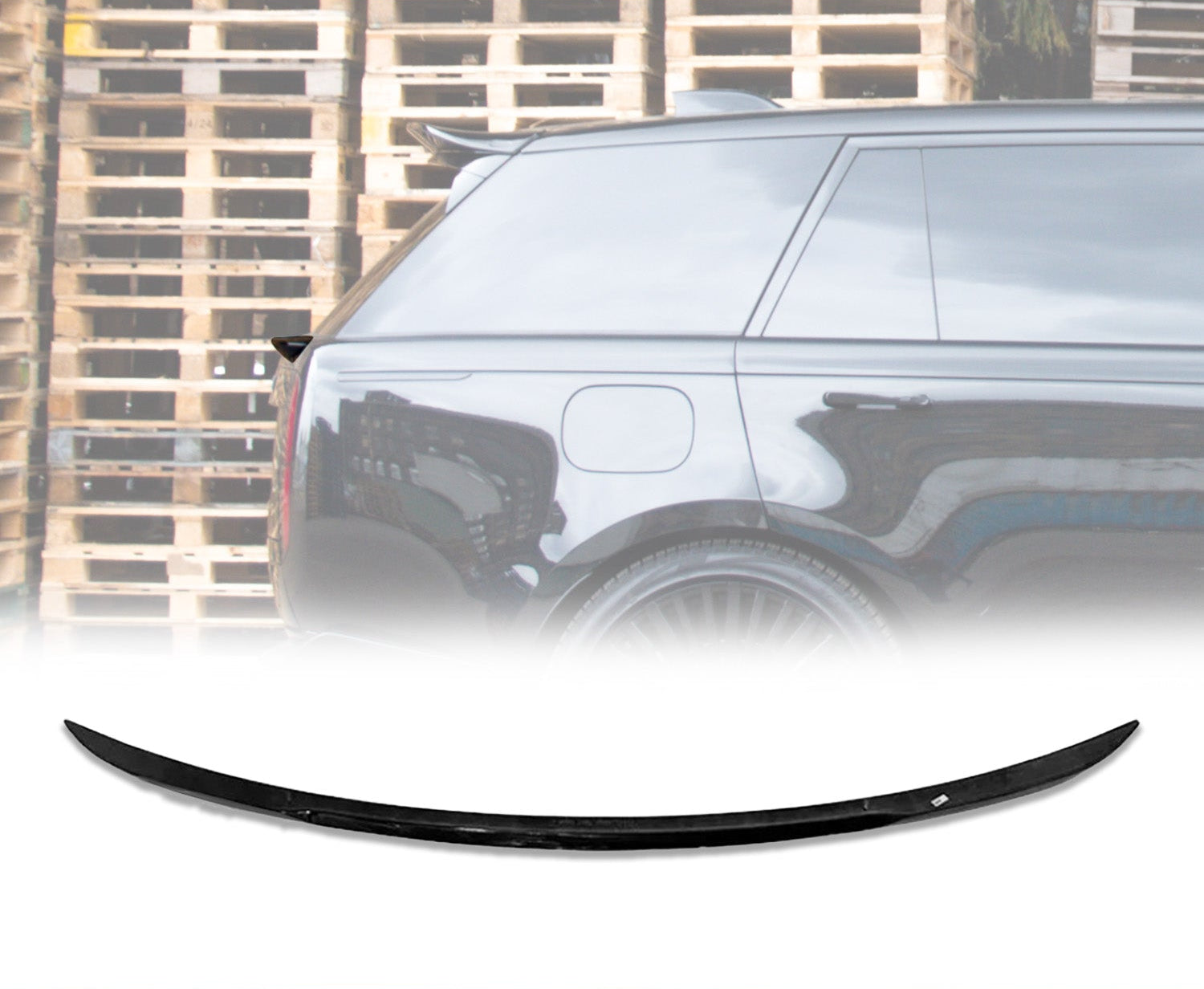Side view of a Range Rover L460 Vogue Gloss Black with a Mid Boot Spoiler with wooden pallets in the opaque white background and the rear roof spoiler placed in front of a white background in the bottom.