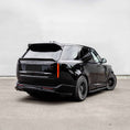 Load image into Gallery viewer, Rear quarter angle view of Range Rover Vogue L460 with Barugzai Nebula bodykit in gloss black
