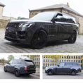 Load image into Gallery viewer, Dark grey Range Rover L405 2018-2021, fitted with SVO style bodykit in an urban setting. Fitted with Barugzai Casanova 22" alloy wheels in Gloss black.
