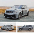 Load image into Gallery viewer, Nardo Grey Range Rover L405 2018-2021, fitted with Barugzai Bison bodykit, shown from different angles with a remote hilly background. Fitted with Barugzai Majestic 24" alloy wheels in Gloss Black Polished Face

