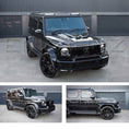 Load image into Gallery viewer, Black Mercedes G Wagon W463A 1997-2018, shot outside Enkahnz HQ. Fitted with Barugzai Shuracan 24" alloy wheels in Gloss Black 
