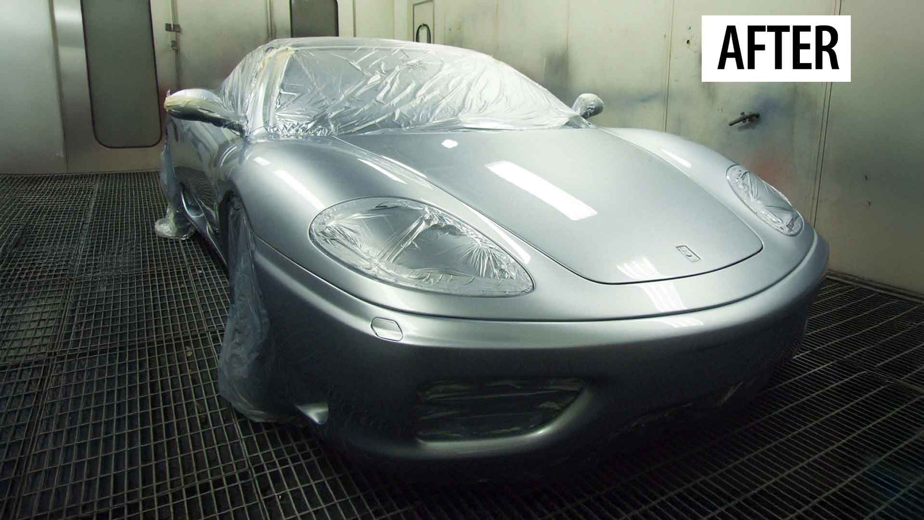 Silver Ferarri 360 Modena sports car accient repair by Enkahnz, in the spraybooth. 