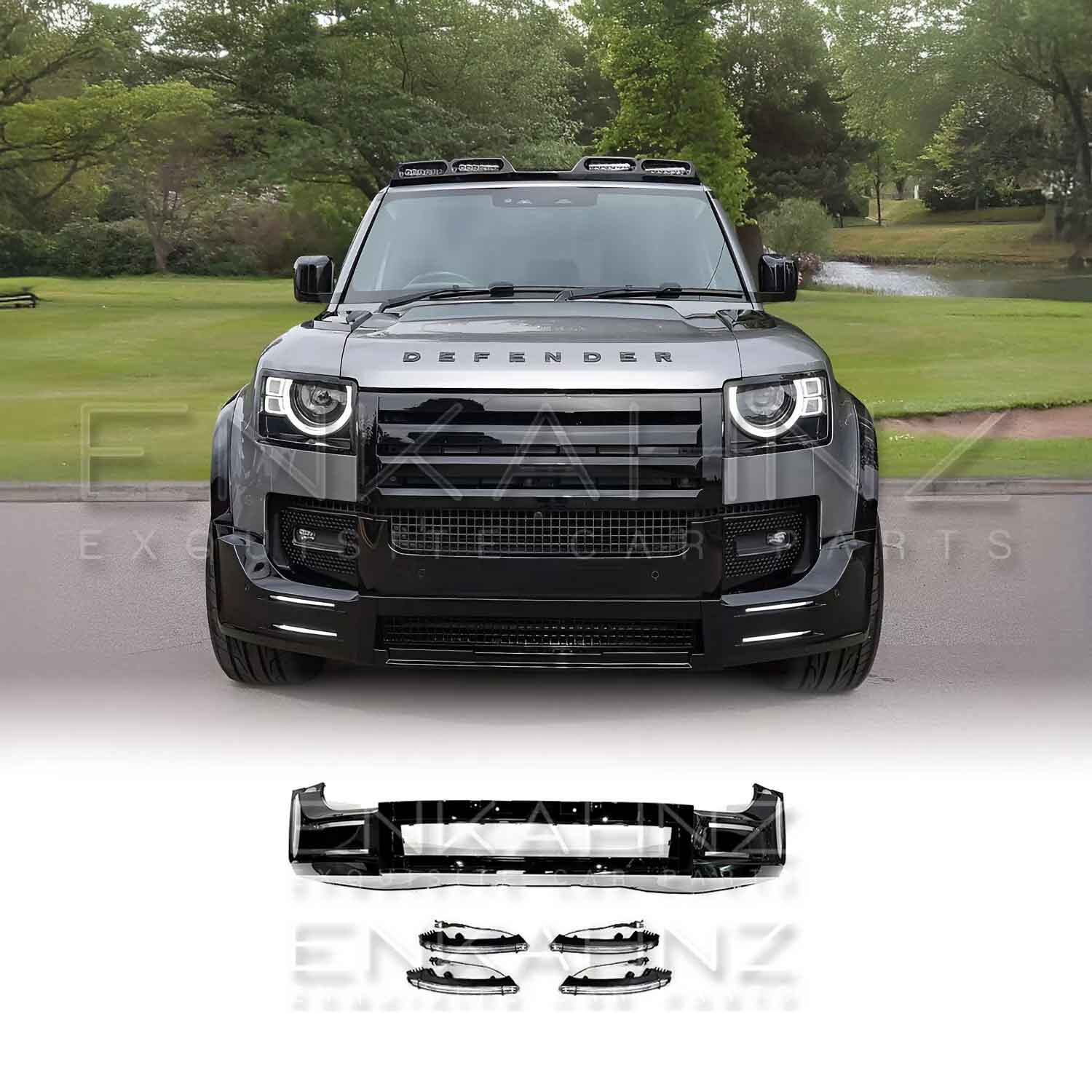 Front view of a Land Rover Defender 110 L663 with additional LM front spoiler and DRL lights on a white background
