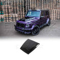 Load image into Gallery viewer, Purple Mercedes-Benz G-Class SUV with a gloss black bonnet scoop BRBS style in front of stacked wooden pallets

