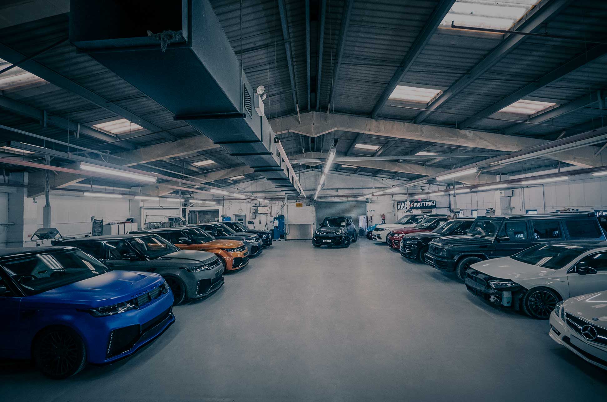 Inside a clean Enkahnz workshop, filled with customised builds, and a few accident repair projects. 