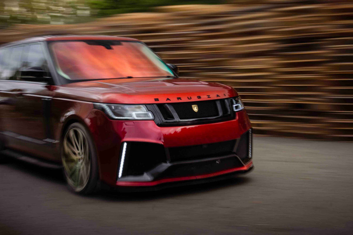 Red Range Rover L405, fitted with Barugzai Bison bodykit on a blurred background, motion blur movement